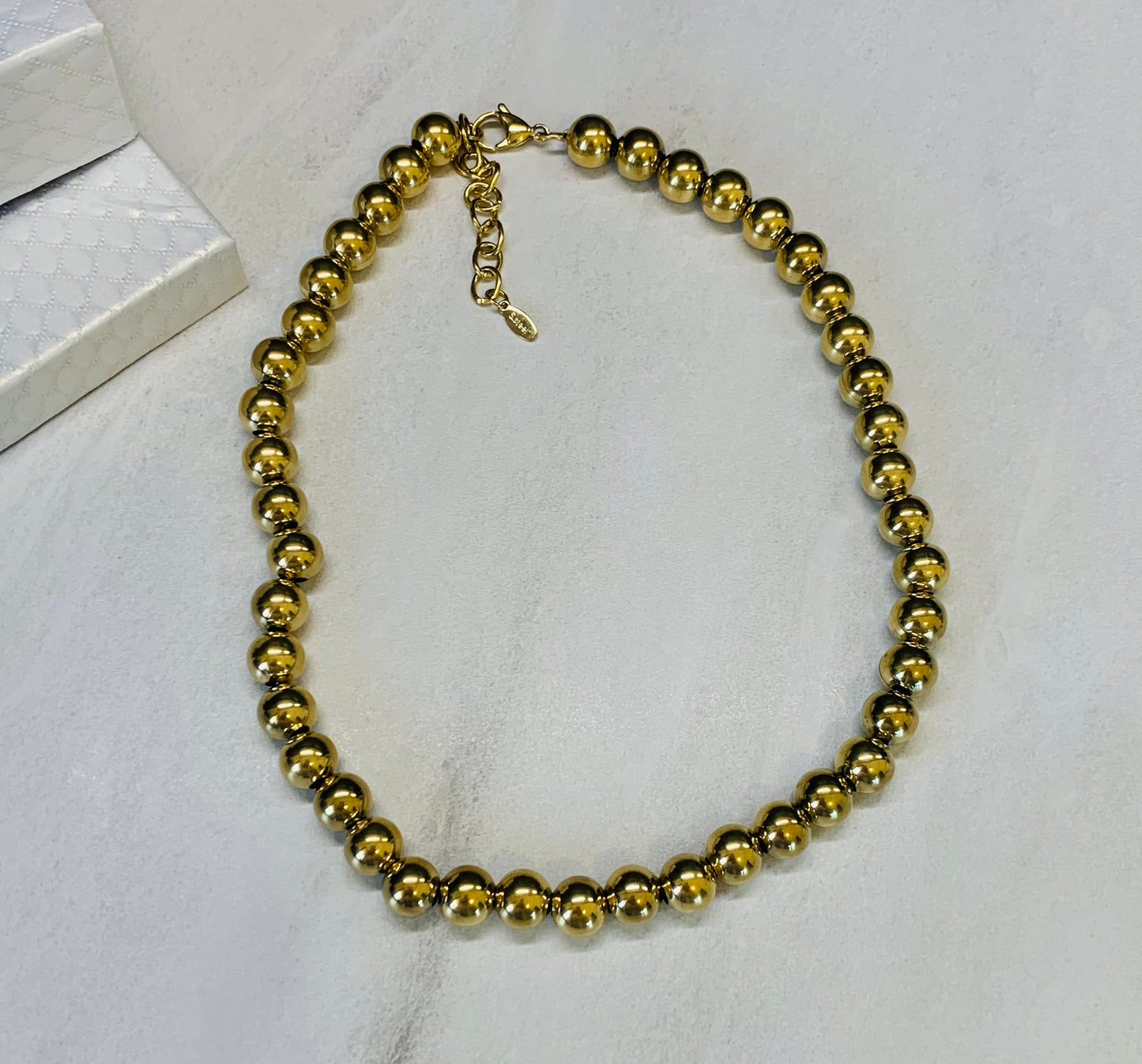 Collana a sfere sonaglio